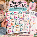 A hand holds a sheet of colorful planner stickers from the 'Hopefilled Snippets Kit' by Ivytree Studio. The sheet features watercolor-style tags with words like 'Rest', 'Courage', 'Grace', and 'Hope' decorated with small hearts and floral designs.